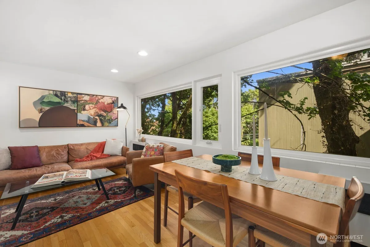 Living and dining room of 632 13th Avenue East, Unit 19, a Capitol Hill condo listing represented by Wesley Gardner