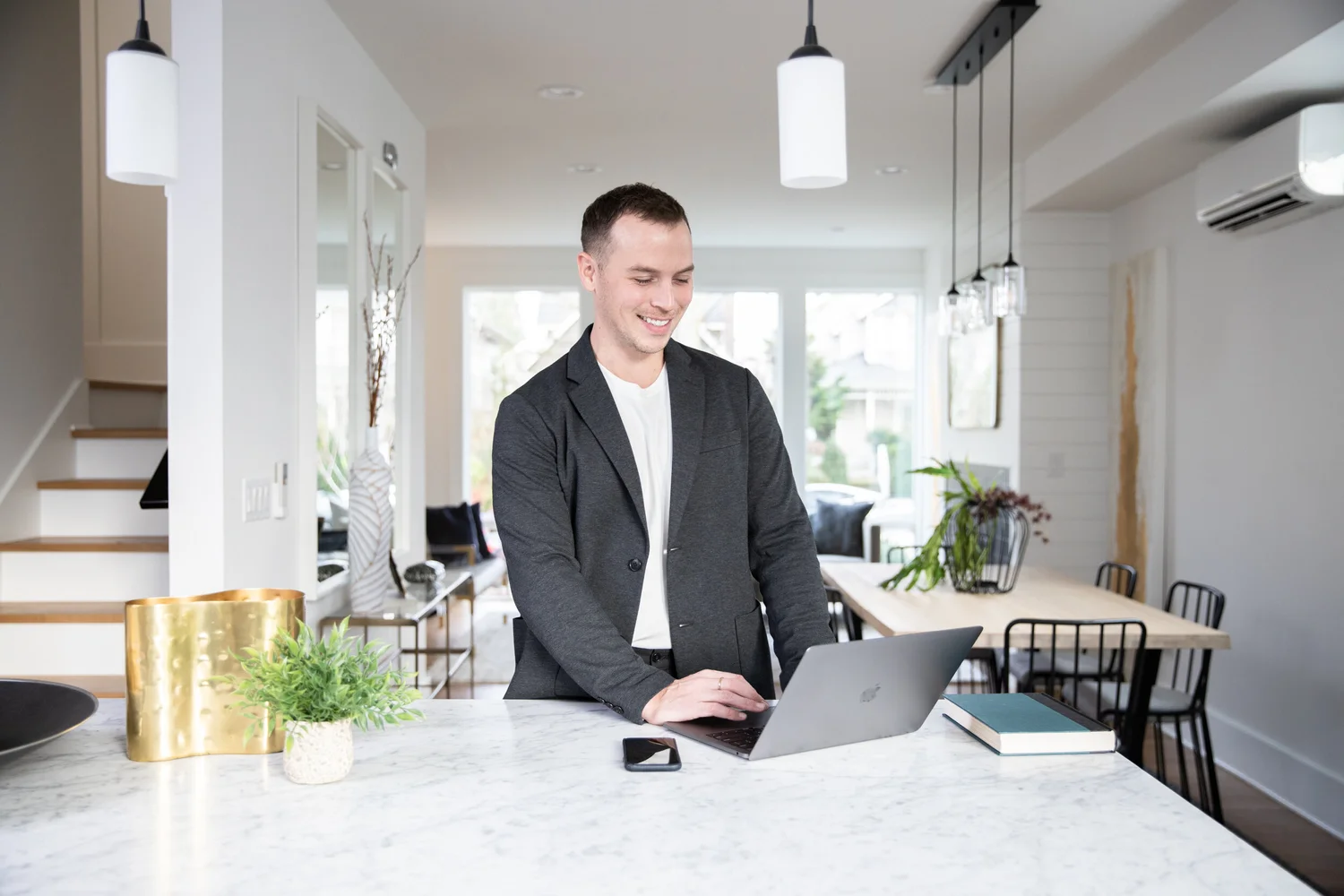 Wesley Gardner working at a client's home during a real estate transaction, Seattle Washington
